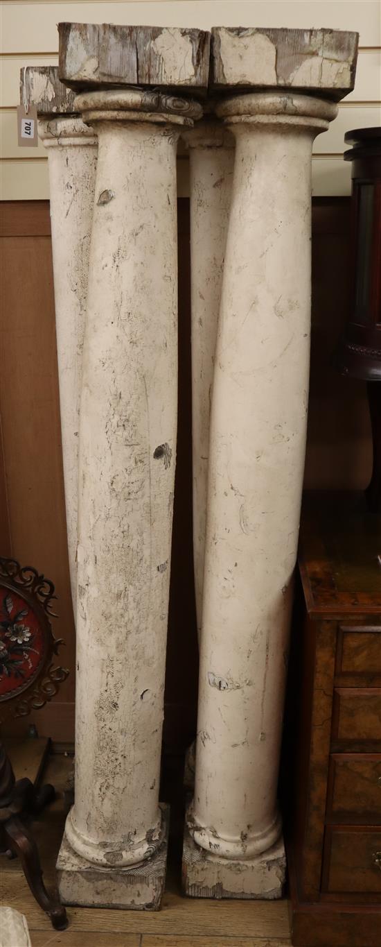 A set of four painted wood columns H.165cm